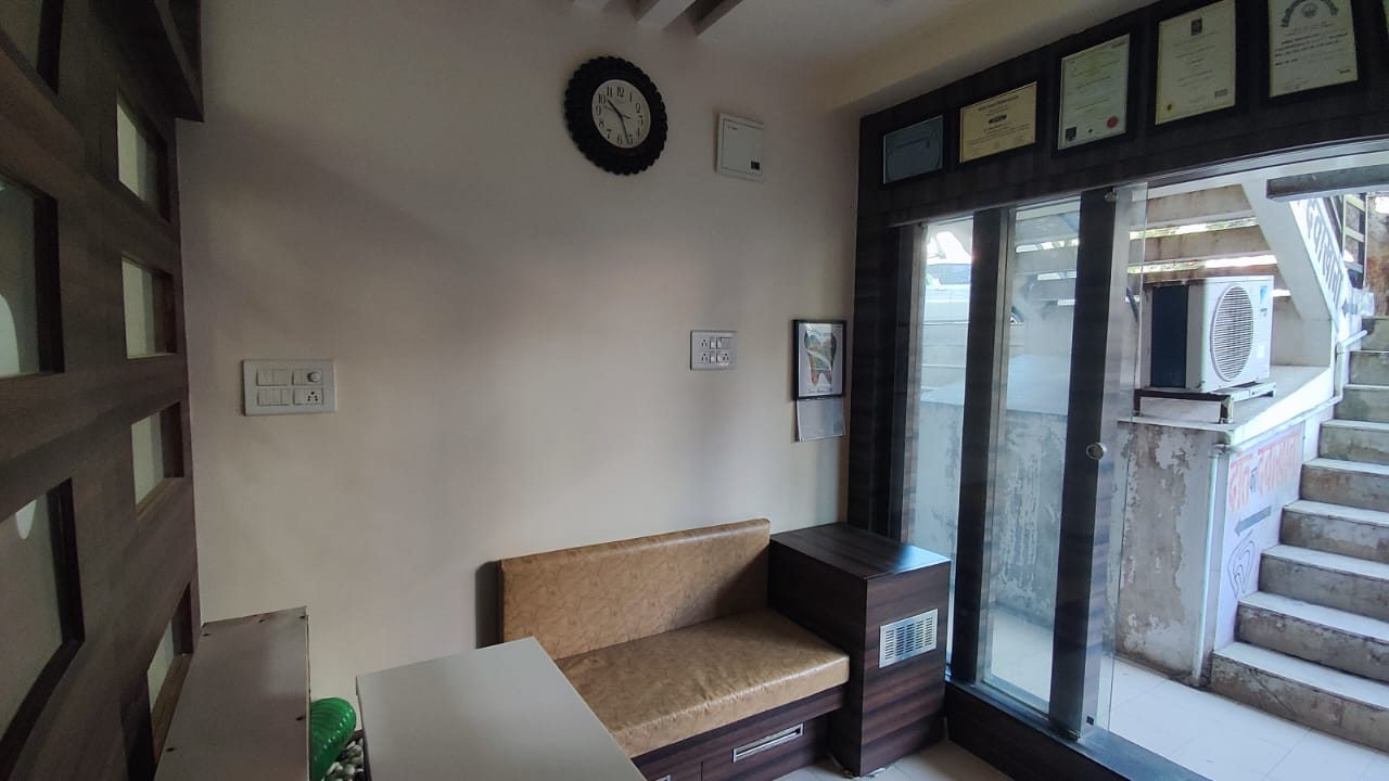 Seating area and certificates at Vijay Nagar clinic, Indore